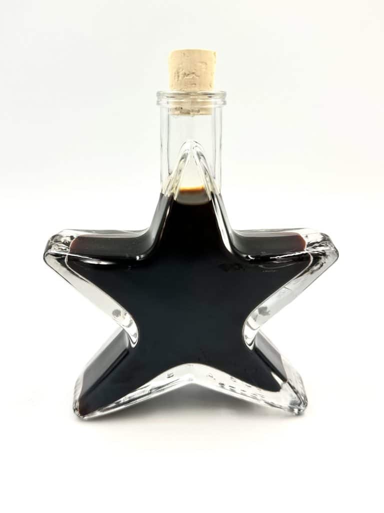 Vinaigre d'ail noir dans son flacon étoile